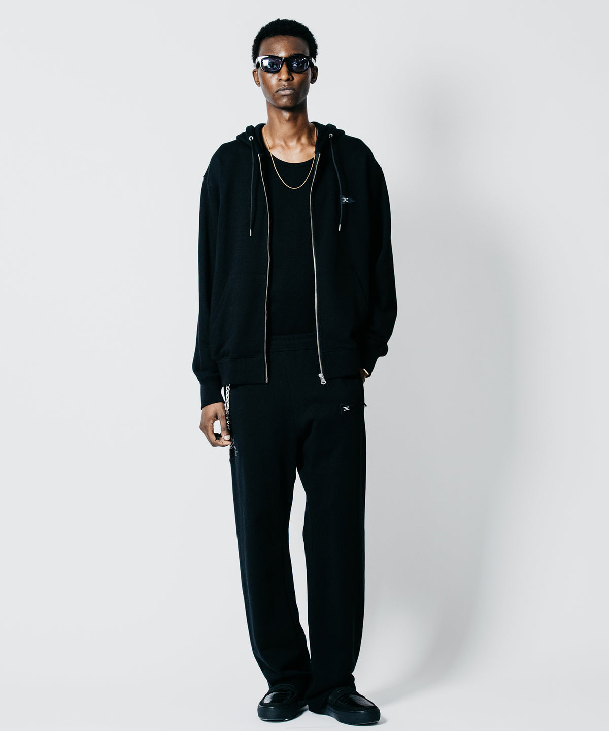 SIGNATURE PATCHWORK SWEAT PANTS